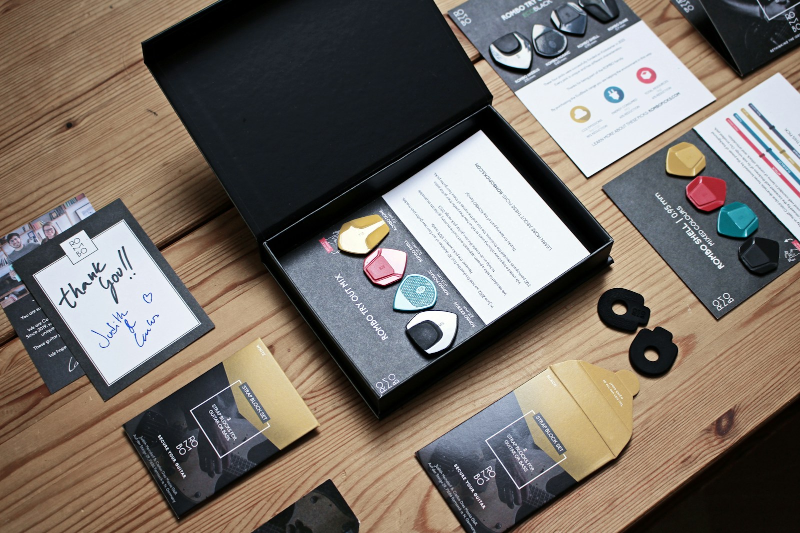 a wooden table topped with lots of different items Branding Kit