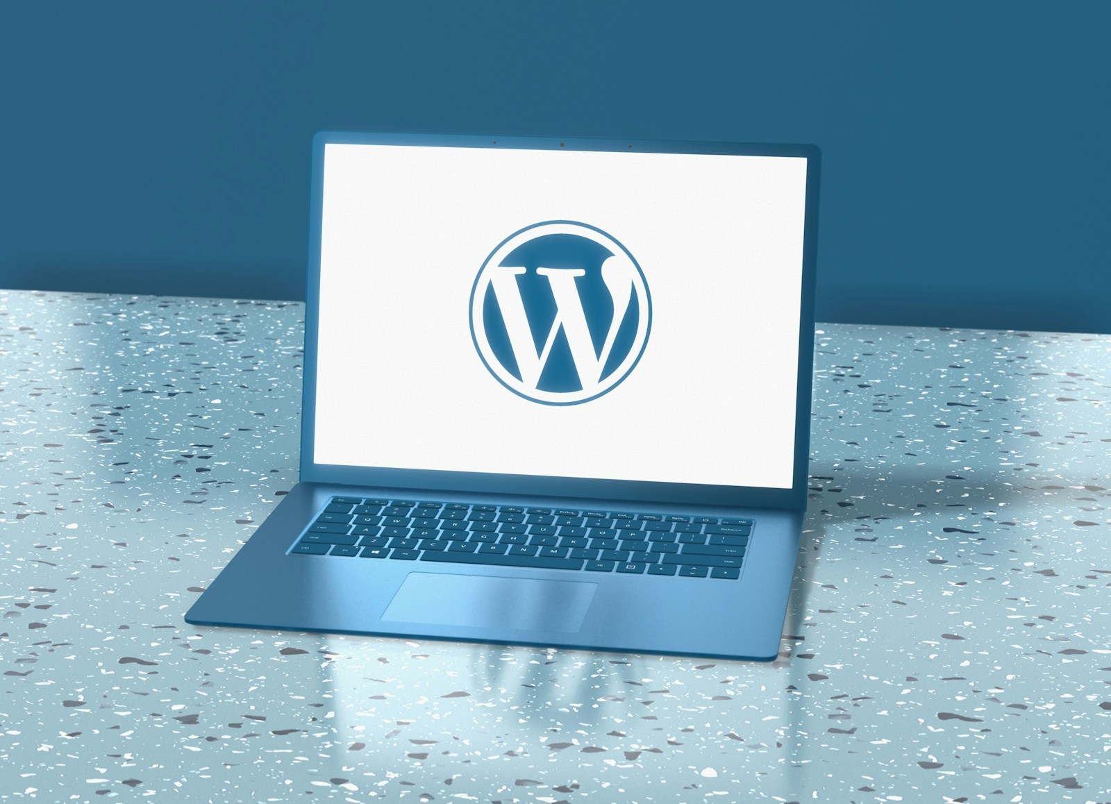 a laptop computer sitting on top of a table (WordPress Developer): The Role They Play in Building a Future-Proof Website