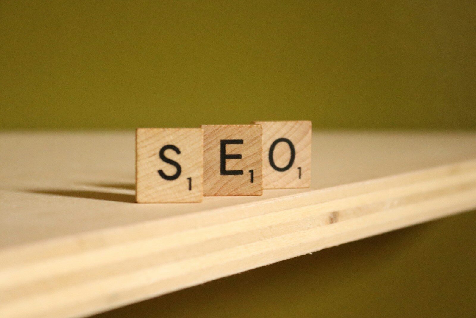 a wooden block that says seo on it SEO Services for Local Business: The Ultimate Beginner-Friendly Growth Guide